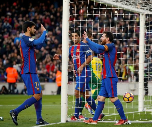 أندريه جوميز وليونيل ميسي