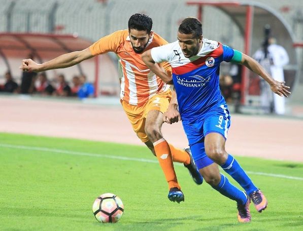 عيسى موسى على اليمين في إحدى مباريات الدروي