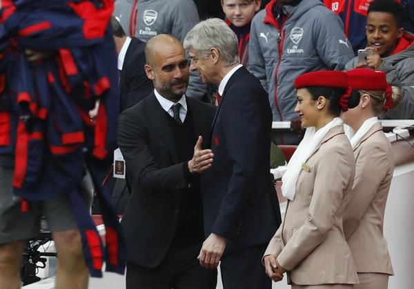 جوارديولا وفينجر