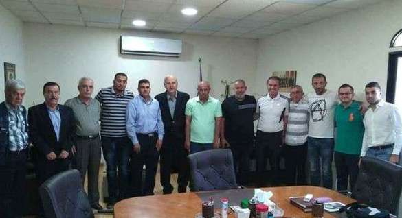 الجهاز الفني الجديد في مقر النادي الأهلي