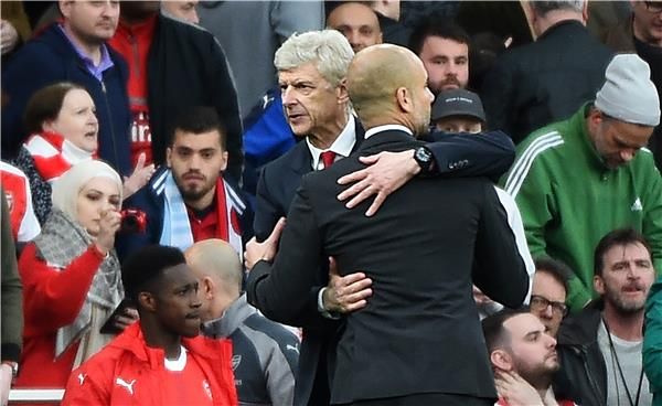 جوارديولا وفينجر