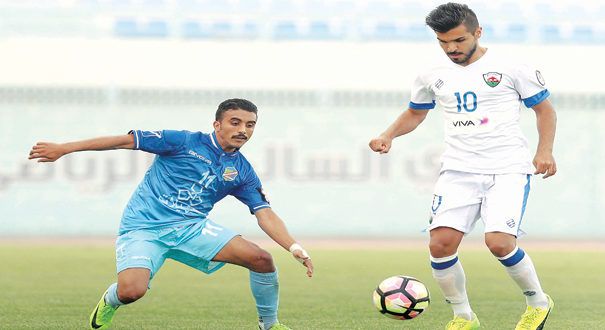 فيصل زايد (يمين)