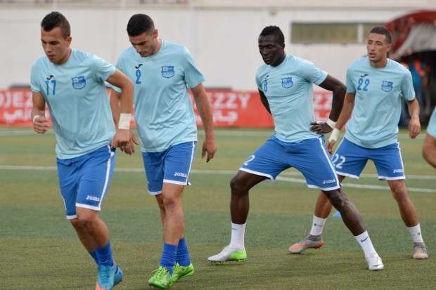 سفيان بوطبة (يمينًا)