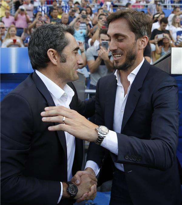 زوبيلديا مع فالفيردي مدرب برشلونة