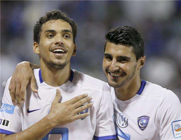 كارلوس إدواردو ( يسارًاً )