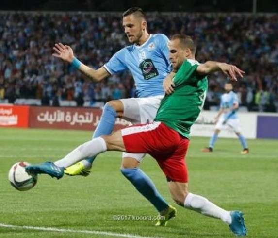 من لقاء سابق بين الوحدات والفيصلي