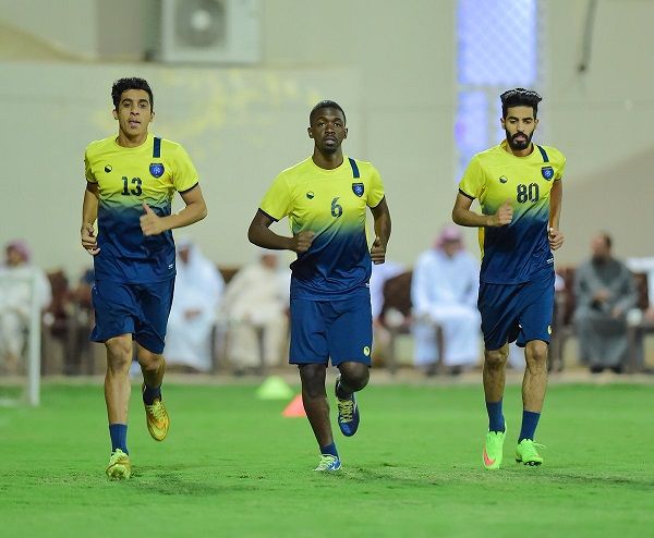 عبدالمجيد السواط (يمين)