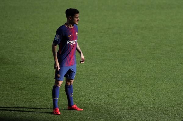 كوتينيو بقميص برشلونة