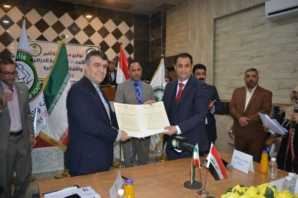 جانب من توقيع الاتفاقية