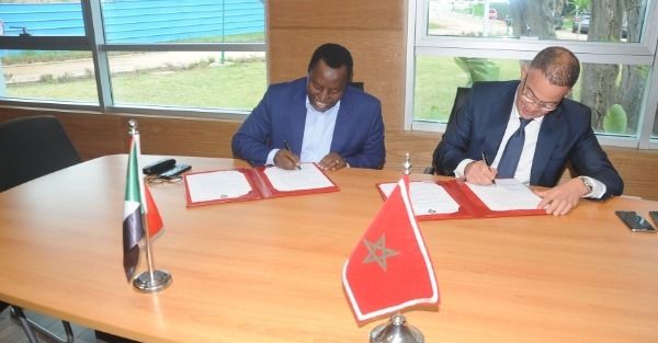 فوزي لقجع وحسن محمد عبد الله برقو