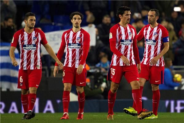 جودين مع لاعبي أتلتيكو مدريد