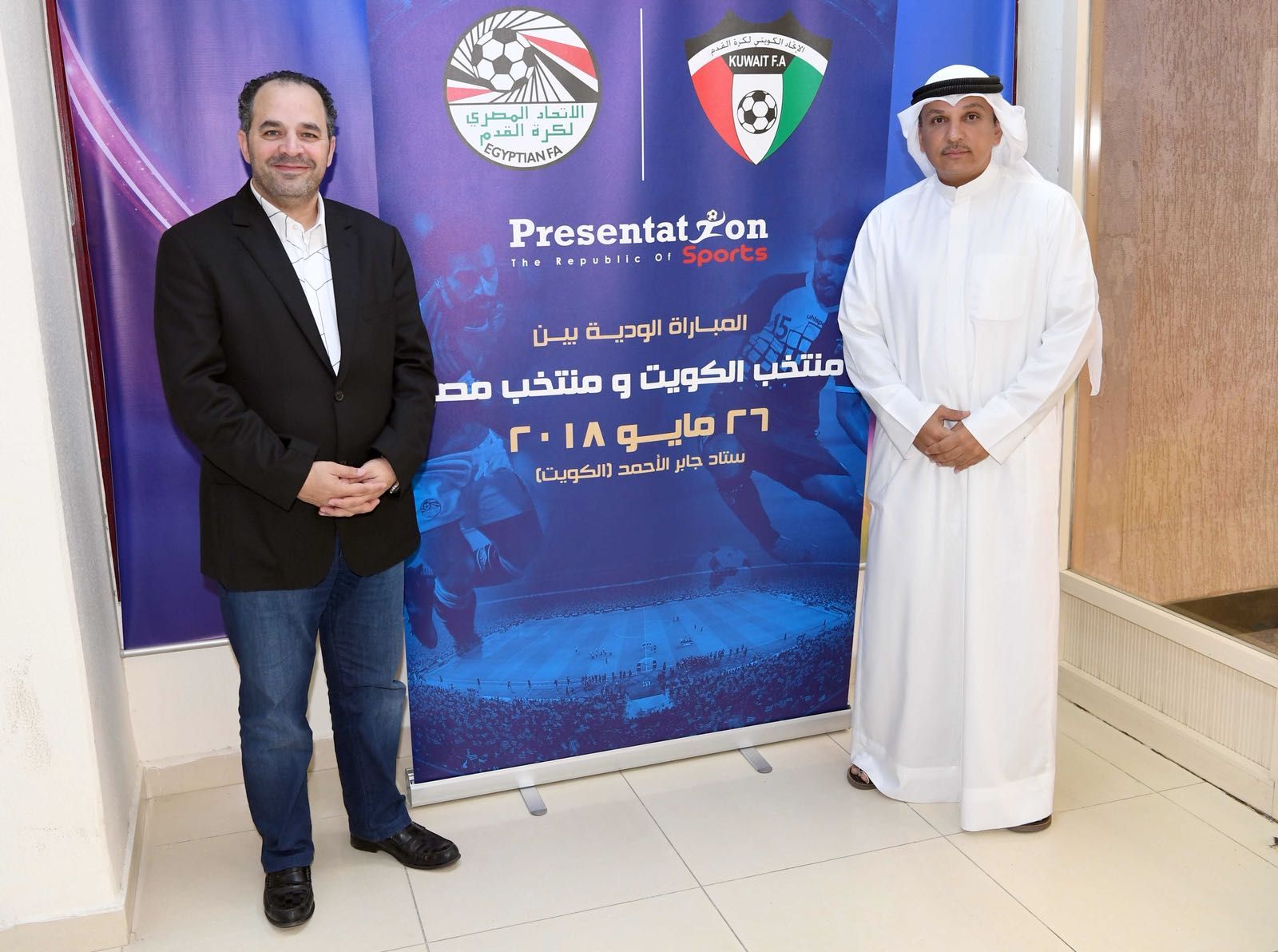 الربيّع وكامل خلال حفل التوقيع