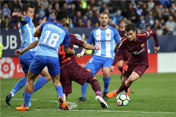 من لقاء برشلونة ومالاجا