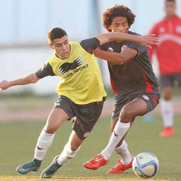 الحبيب الوسلاتي (يسار)