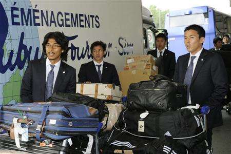 لاعبي المنتخب الياباني عند وصولهم لسويسرا