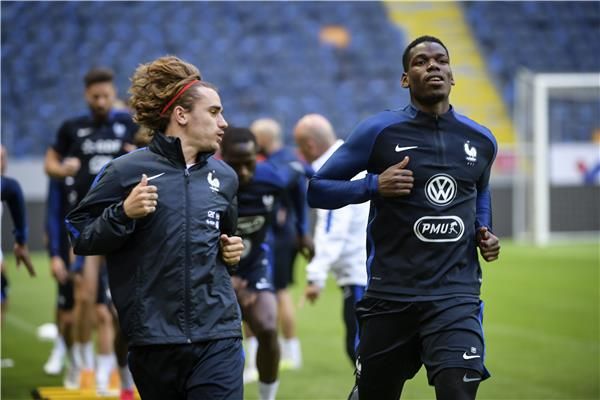 أنطوان جريزمان وبول بوجبا