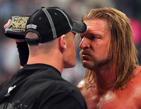 تريبل إتش وجون سينا