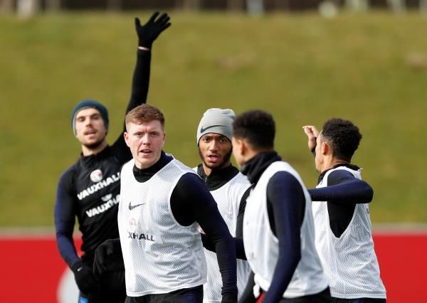 ماوسون مع لاعبي سوانزي