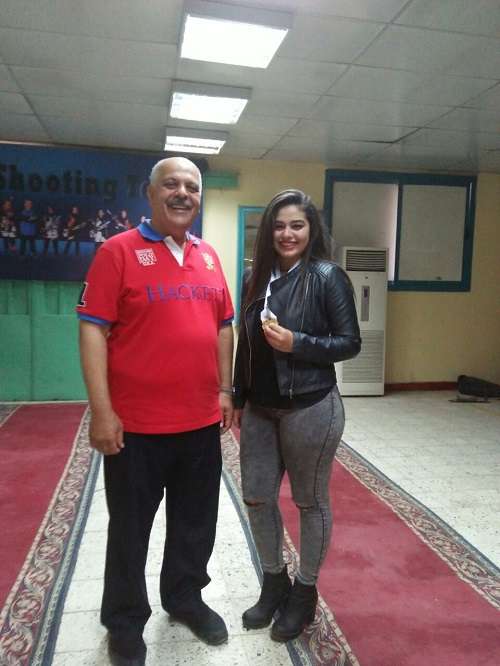 عفاف الهدهد مع رئيس اتحاد الرماية حازم حسني