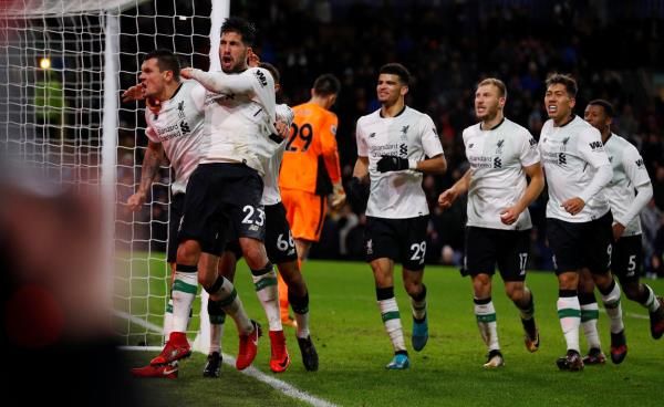 إيمري تشان مع فريقه