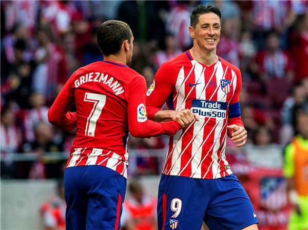 توريس وجريزمان 