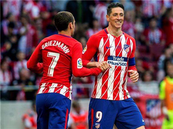 توريس وجريزمان 