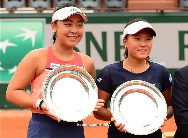 ?i=epa%2ftennis%2f2018-06%2f2018-06-10-06798431_epa