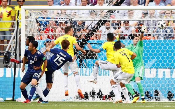 جانب من مباراة اليابان وكولومبيا