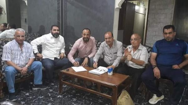 جانب من التوقيع