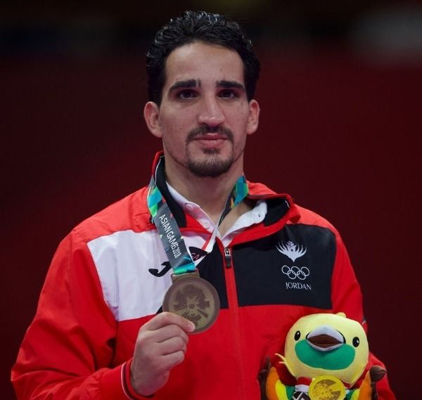 النجار يكتفي بالبرونزية