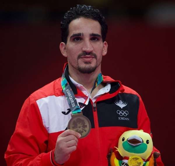 النجار يكتفي بالبرونزية