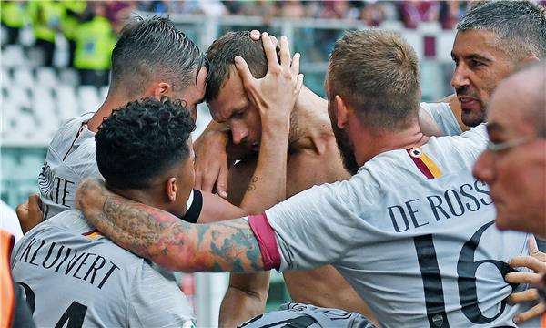 دجيكو مع فريقه