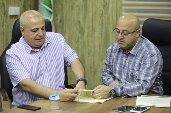 جانب من توقيع المدرب