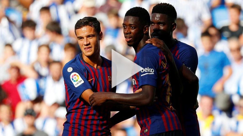 كوتينيو مع لاعبي برشلونة