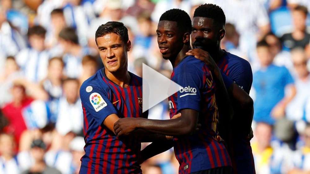 كوتينيو مع لاعبي برشلونة