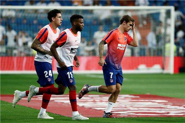 خيمينيز مع لاعبي أتلتيكو