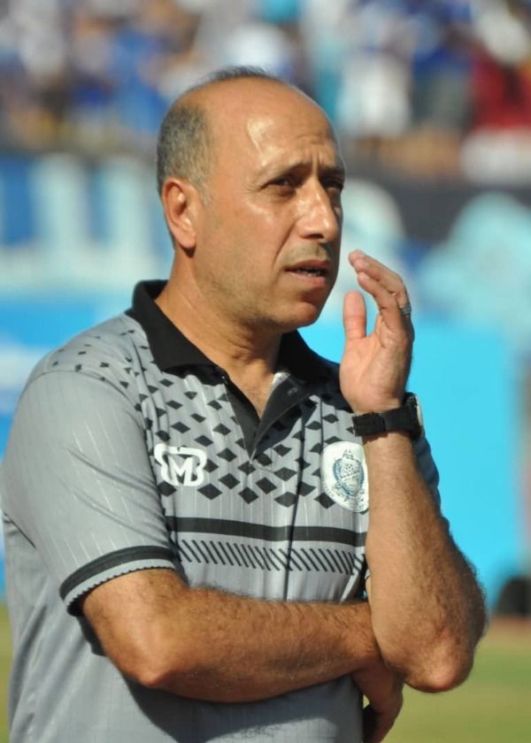  الراحل محمد العطار