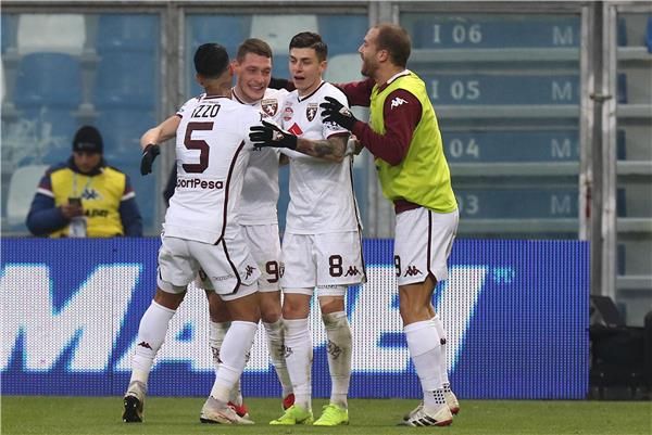 بيلوتي مع لاعبي تورينيو