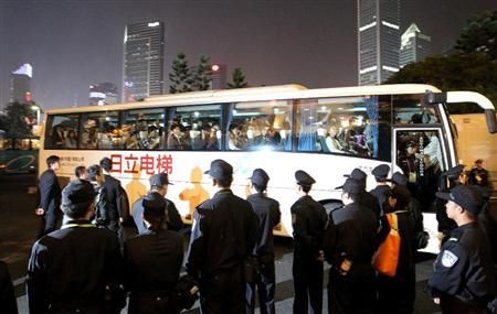 قوات الأمن الصينية قامت بحماية الجماهير اليابانية بعد نهاية المباراة