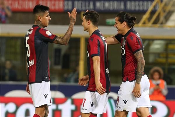 أورسوليني مع لاعبي بولونيا