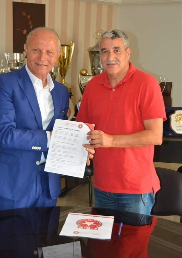 كمال عقاب ورئيس النجم الساحلي