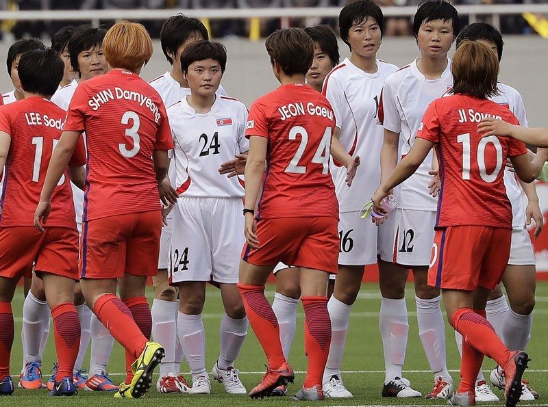 لاعبات كوريا الجنوبية والشمالية