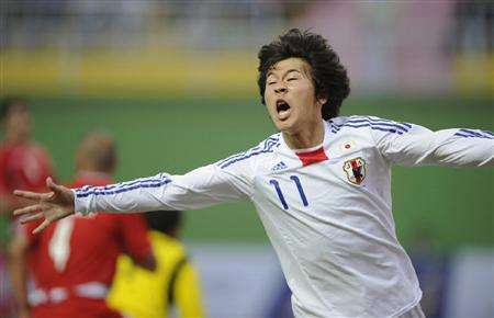 كينسوكي ناغاي يحتفل بعد إحرازه الهدف الحاسم بمرمى منتخب إيران