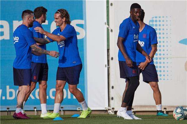 جريزمان وميسي