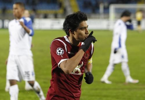 2010-11-24t183250z_01_kaz05_rtridsp_3_soccer-champions_reuters