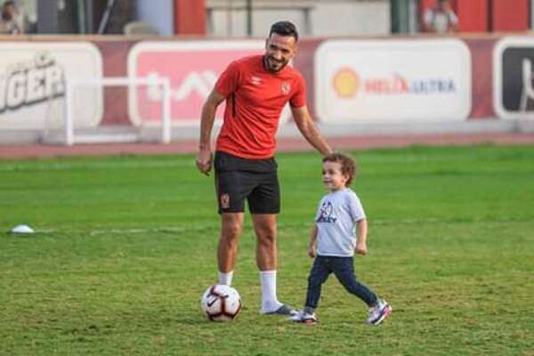 علي معلول وابنه