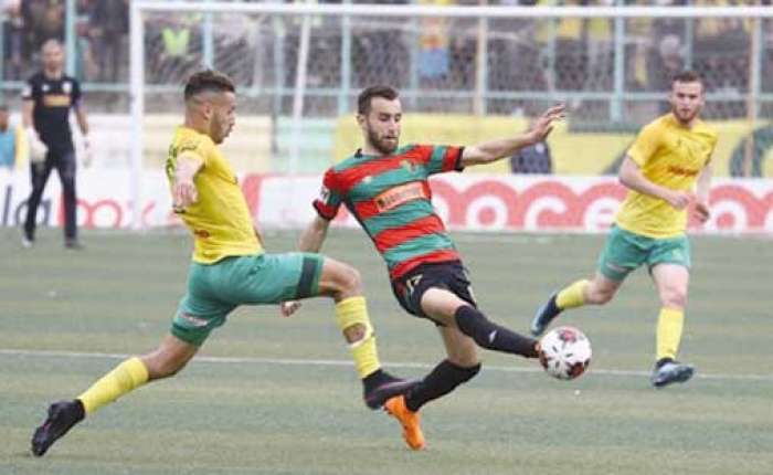 من مباراة سابقة بين الفريقين