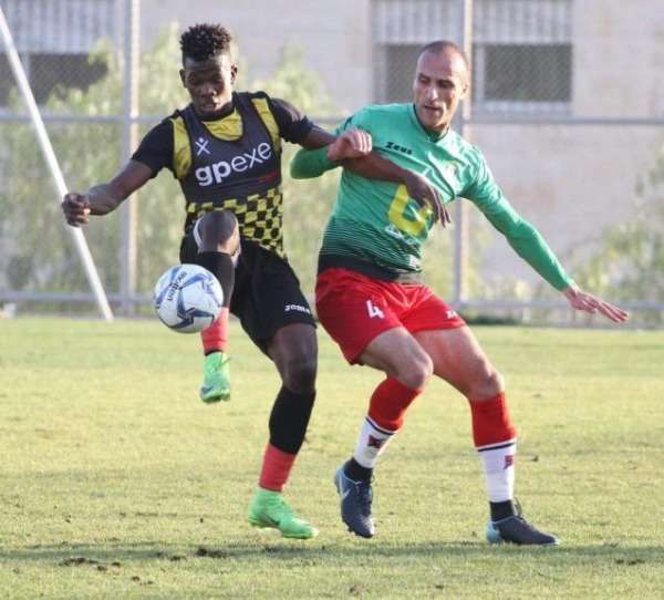 من مباراة الوحدات والمنتخب الأولمبي