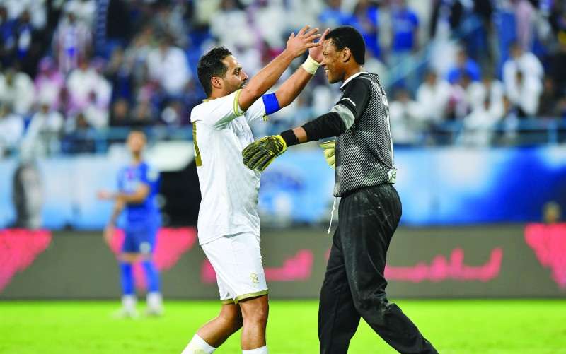 ياسر القحطاني ومحمد الدعيع