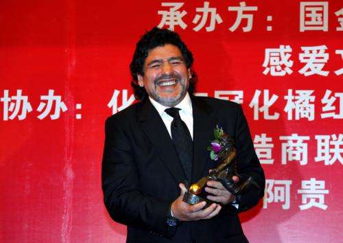 2010-11-04t103940z_01_dbg214_rtridsp_3_china-maradona_reuters